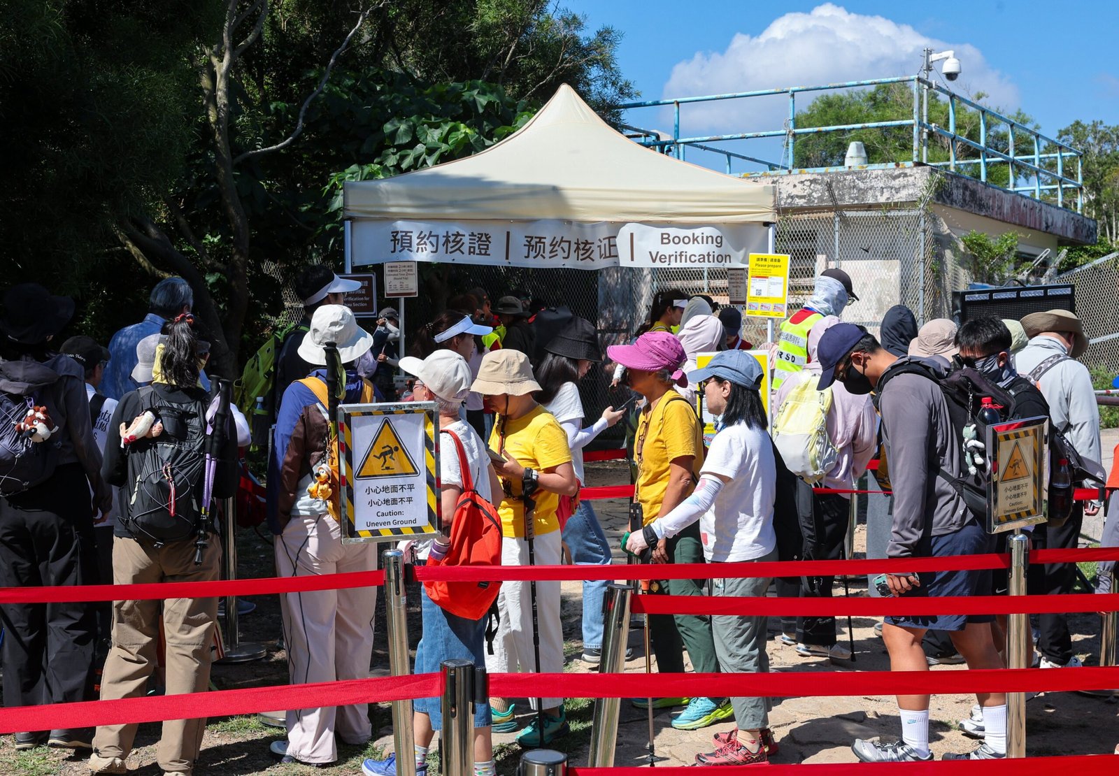 Visitors wait to use Po Pin Chau’s booking system on Saturday. Photo: Edmond So